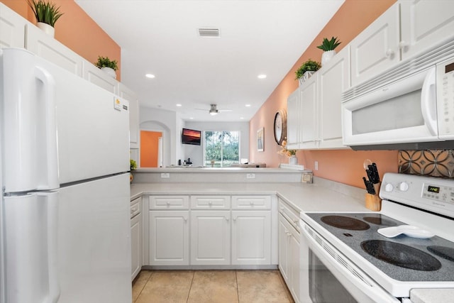 kitchen with ceiling fan, white cabinetry, light tile patterned flooring, and white appliances