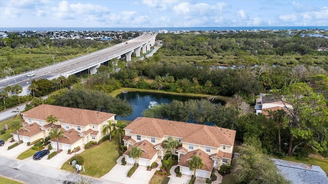 drone / aerial view with a water view