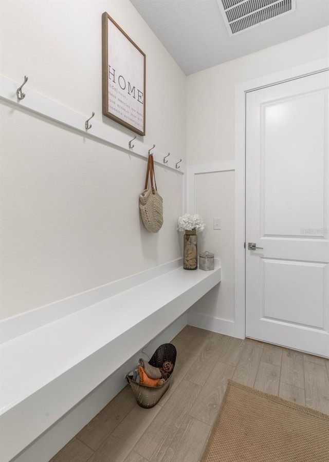 19 Essex Ln, Palm Coast, FL 32164 - mudroom with visible vents and light wood-type flooring