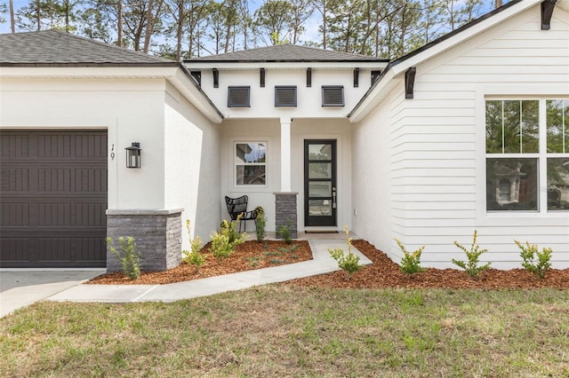 19 Essex Ln, Palm Coast, FL 32164 - property entrance with stucco siding, roof with shingles, and an attached garage
