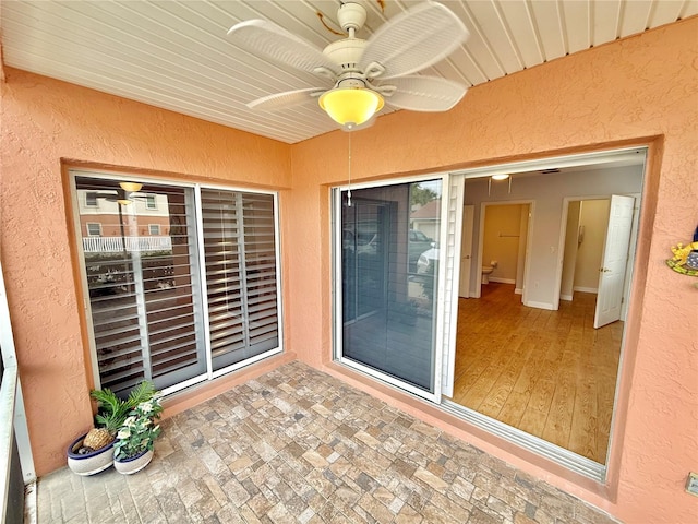 view of patio with ceiling fan