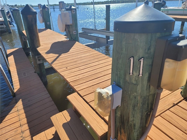 dock area featuring a water view