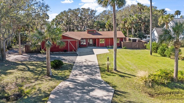 ranch-style home with a front yard