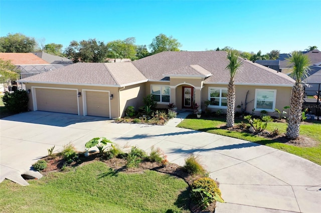 ranch-style home featuring a front yard and a garage