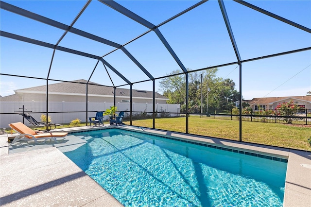 view of pool featuring a lanai, a patio area, and a lawn