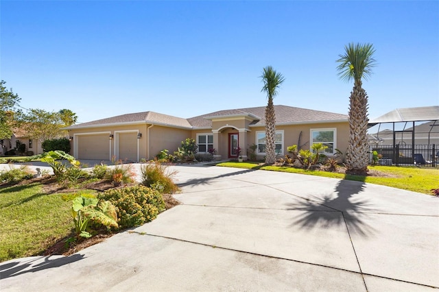 view of front of property with a garage, a front lawn, and a lanai