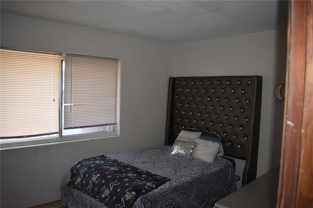 bedroom with a textured ceiling