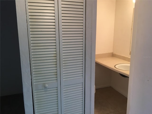 bathroom with tile patterned flooring