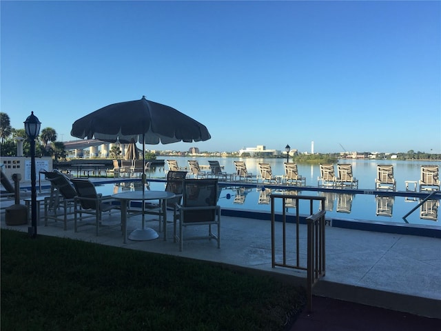 dock area with a water view