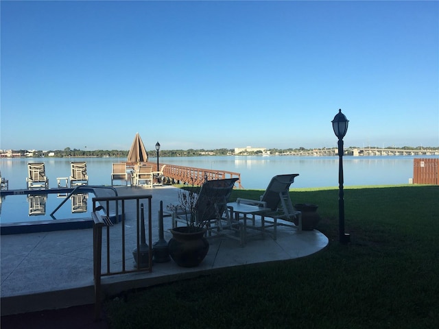 dock area featuring a water view