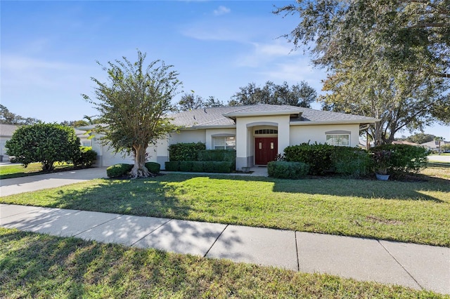 view of front of home with a front lawn