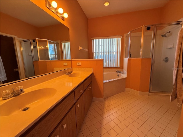 bathroom featuring vanity, tile patterned floors, and independent shower and bath