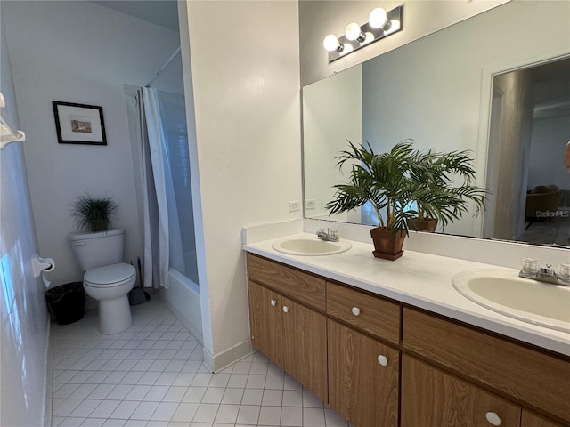 full bathroom with toilet, vanity, tile patterned floors, and shower / tub combo with curtain