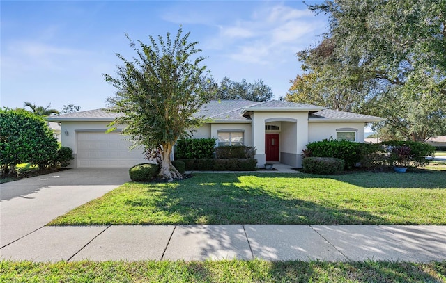 view of front facade with a front lawn and a garage