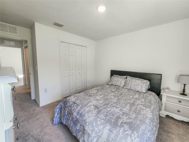 carpeted bedroom with a closet