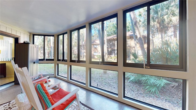 sunroom / solarium featuring plenty of natural light