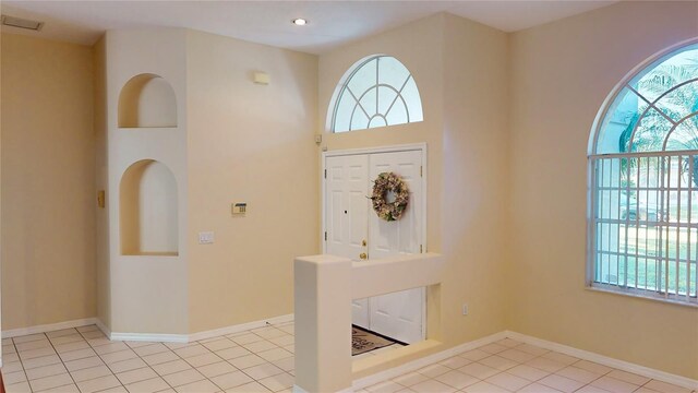 tiled entrance foyer with plenty of natural light