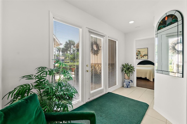 7 Jasmine Run, Ormond Beach, FL 32174 - doorway to outside with tile patterned flooring and recessed lighting