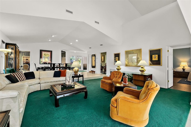 living room featuring wood-type flooring and lofted ceiling