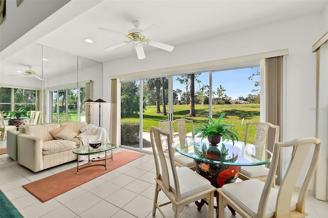 sunroom with ceiling fan and a healthy amount of sunlight