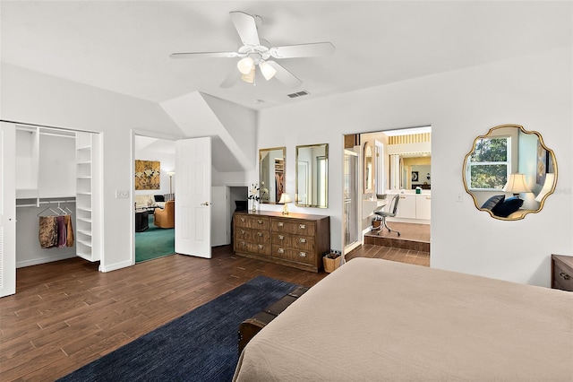 bedroom with ceiling fan and dark wood-type flooring