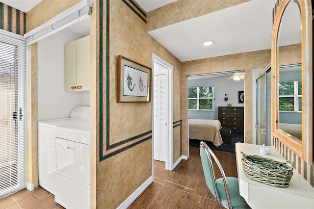 7 Jasmine Run, Ormond Beach, FL 32174 - washroom with cabinet space, wood finished floors, baseboards, and ceiling fan