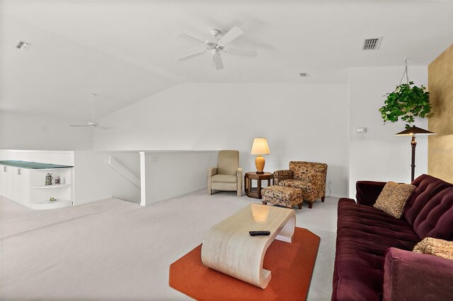 7 Jasmine Run, Ormond Beach, FL 32174 - living area featuring a ceiling fan, carpet, and vaulted ceiling