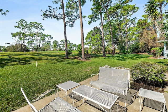 7 Jasmine Run, Ormond Beach, FL 32174 - view of grassy yard with a patio area