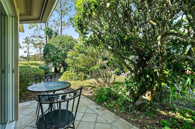 7 Jasmine Run, Ormond Beach, FL 32174 - view of patio featuring outdoor dining space