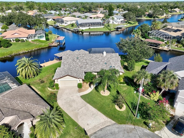 birds eye view of property featuring a water view