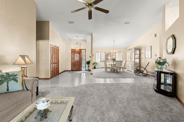 interior space with ceiling fan with notable chandelier and vaulted ceiling