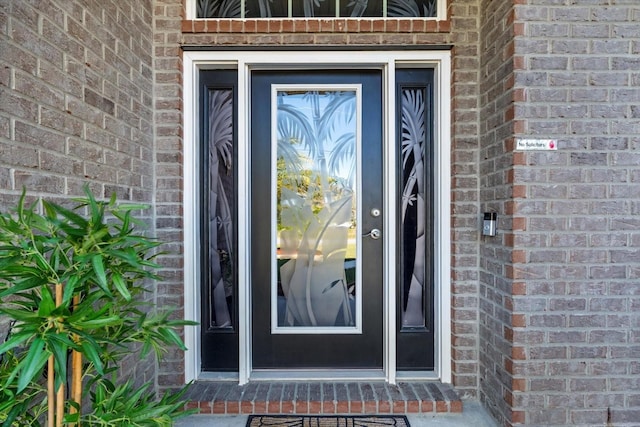 6 Lindsay Dr, Palm Coast, FL 32137 - property entrance with brick siding