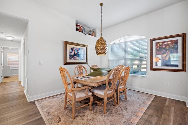 6 Lindsay Dr, Palm Coast, FL 32137 - dining room featuring light wood-type flooring and baseboards