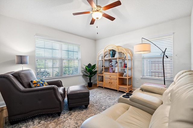 6 Lindsay Dr, Palm Coast, FL 32137 - living room featuring a ceiling fan, baseboards, and wood finished floors
