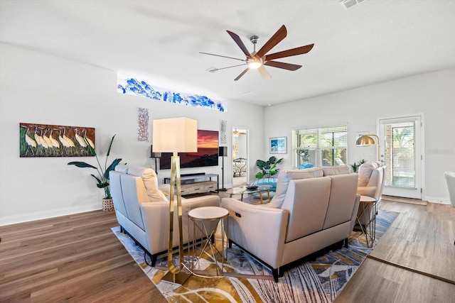 6 Lindsay Dr, Palm Coast, FL 32137 - living area featuring ceiling fan, wood finished floors, and baseboards