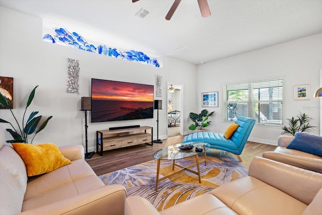 6 Lindsay Dr, Palm Coast, FL 32137 - living area featuring ceiling fan, wood finished floors, and baseboards
