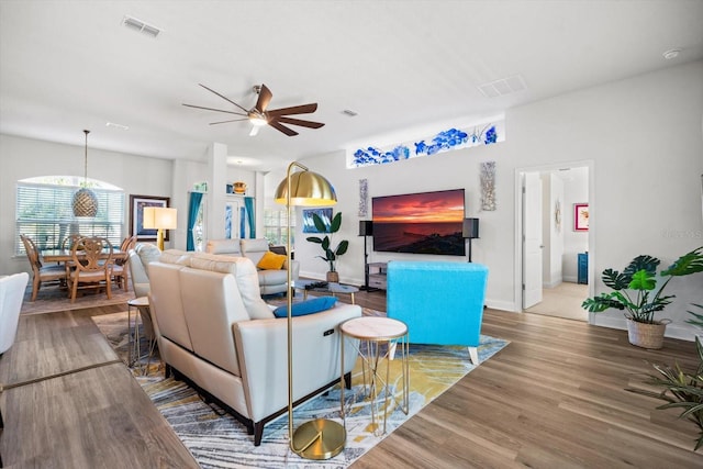 6 Lindsay Dr, Palm Coast, FL 32137 - living area with ceiling fan, wood finished floors, and baseboards