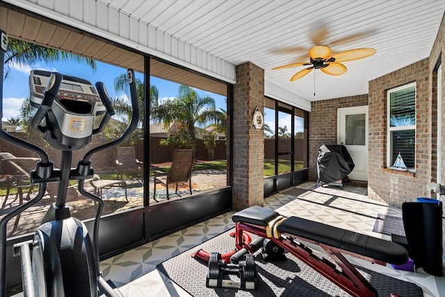 6 Lindsay Dr, Palm Coast, FL 32137 - sunroom / solarium featuring brick wall and a ceiling fan
