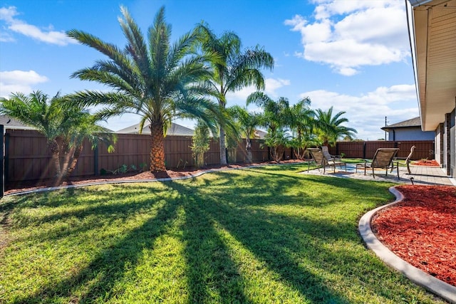 6 Lindsay Dr, Palm Coast, FL 32137 - view of yard featuring a patio area