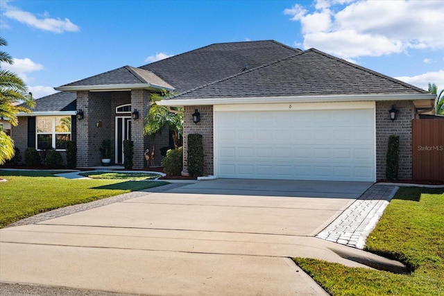 6 Lindsay Dr, Palm Coast, FL 32137 - view of front facade with brick siding, a front yard, concrete driveway, a garage, and a shingled roof