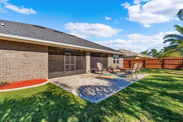 6 Lindsay Dr, Palm Coast, FL 32137 - rear view of property featuring brick siding, a sunroom, a patio area, a shingled roof, and a ceiling fan