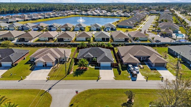 6 Lindsay Dr, Palm Coast, FL 32137 - aerial perspective of suburban area with a large body of water