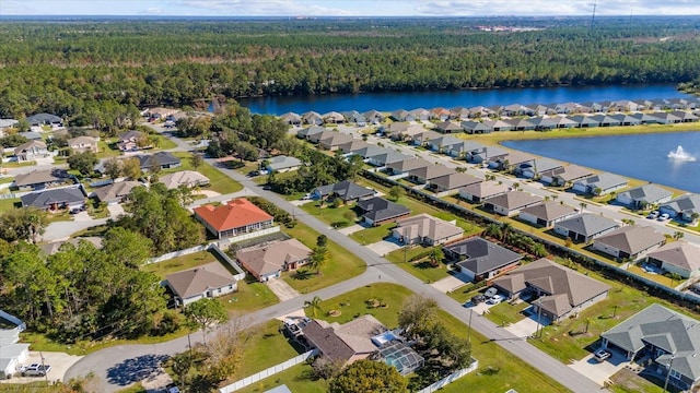 6 Lindsay Dr, Palm Coast, FL 32137 - view of property location with a heavily wooded area, a nearby body of water, and nearby suburban area