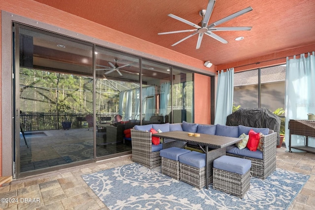 exterior space with ceiling fan