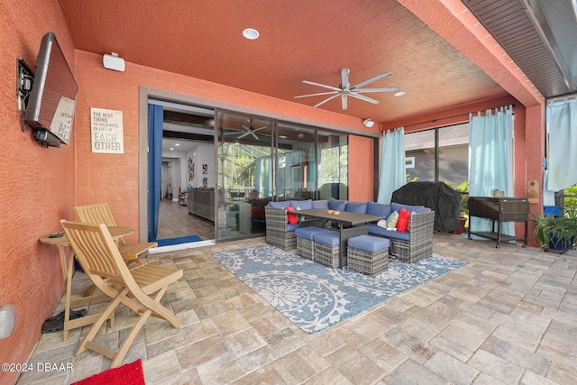 view of patio featuring outdoor lounge area and ceiling fan