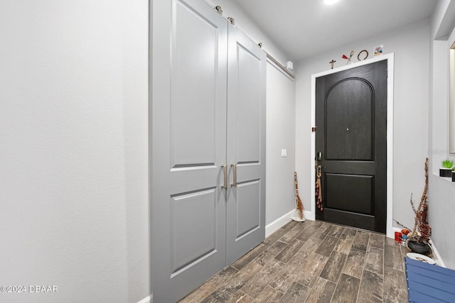 doorway to outside featuring dark hardwood / wood-style floors