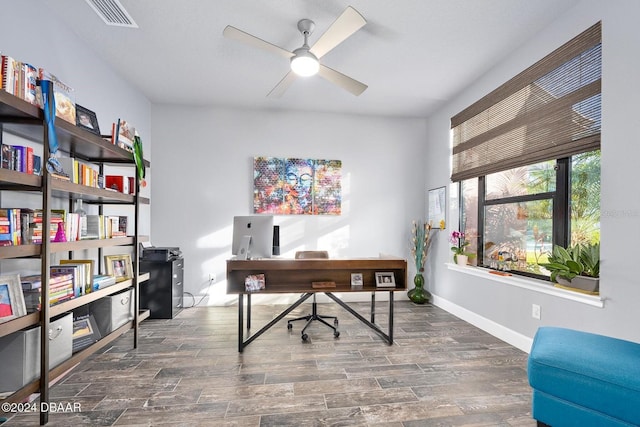 office area featuring ceiling fan and dark hardwood / wood-style floors