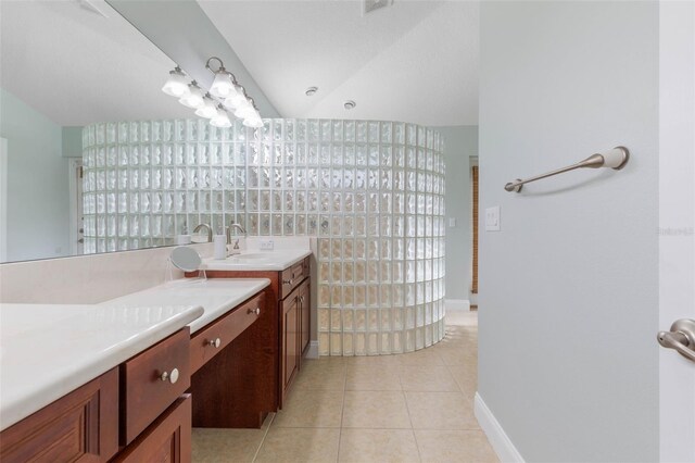 bathroom featuring tile patterned floors and sink