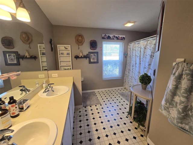 bathroom with vanity and walk in shower