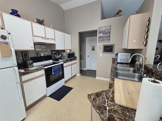 kitchen with sink, white cabinetry, high vaulted ceiling, range with electric stovetop, and white fridge